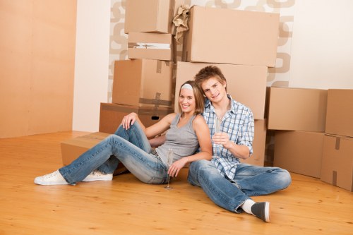 Moving team handling house removals on a residential street in Dulwich