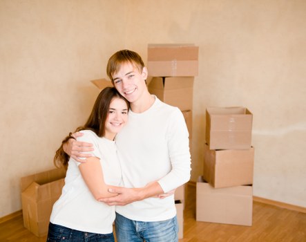 Packed office boxes and furniture ready for transport