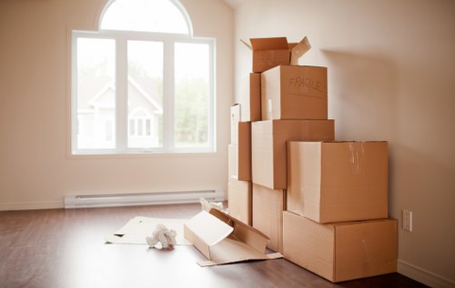 Local moving team loading furniture into a van