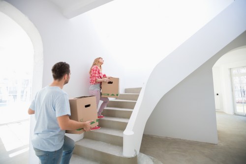 Careful wrapping of fragile household items during a Dulwich move