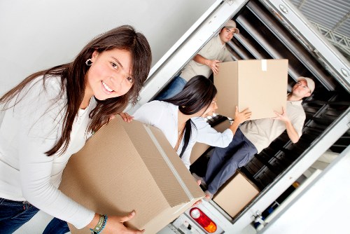 Dulwich residents preparing boxes and furniture for a moving van