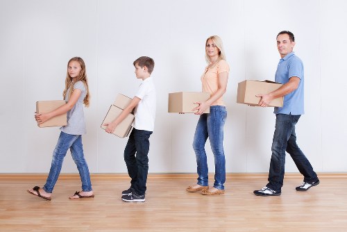 Professional moving team loading furniture in Dulwich